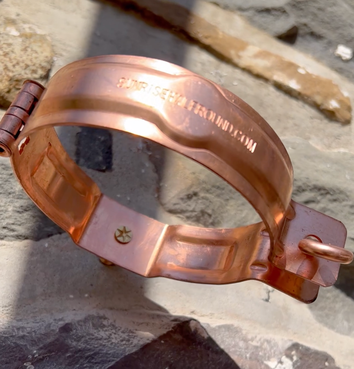 Copper hinged bracket for 4 inch downspout