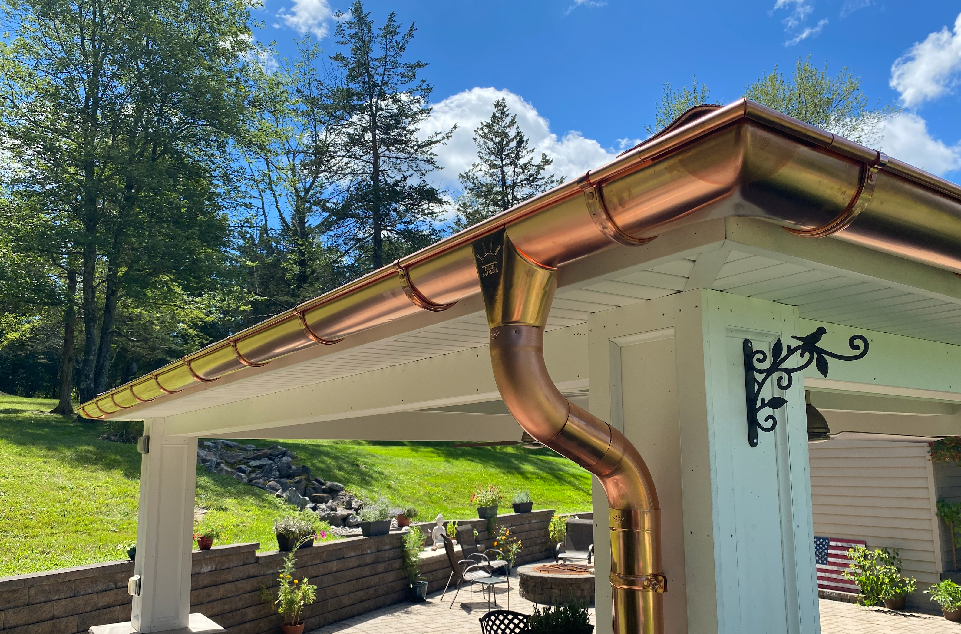 Sunrise half round copper gutter system installed on a residential home