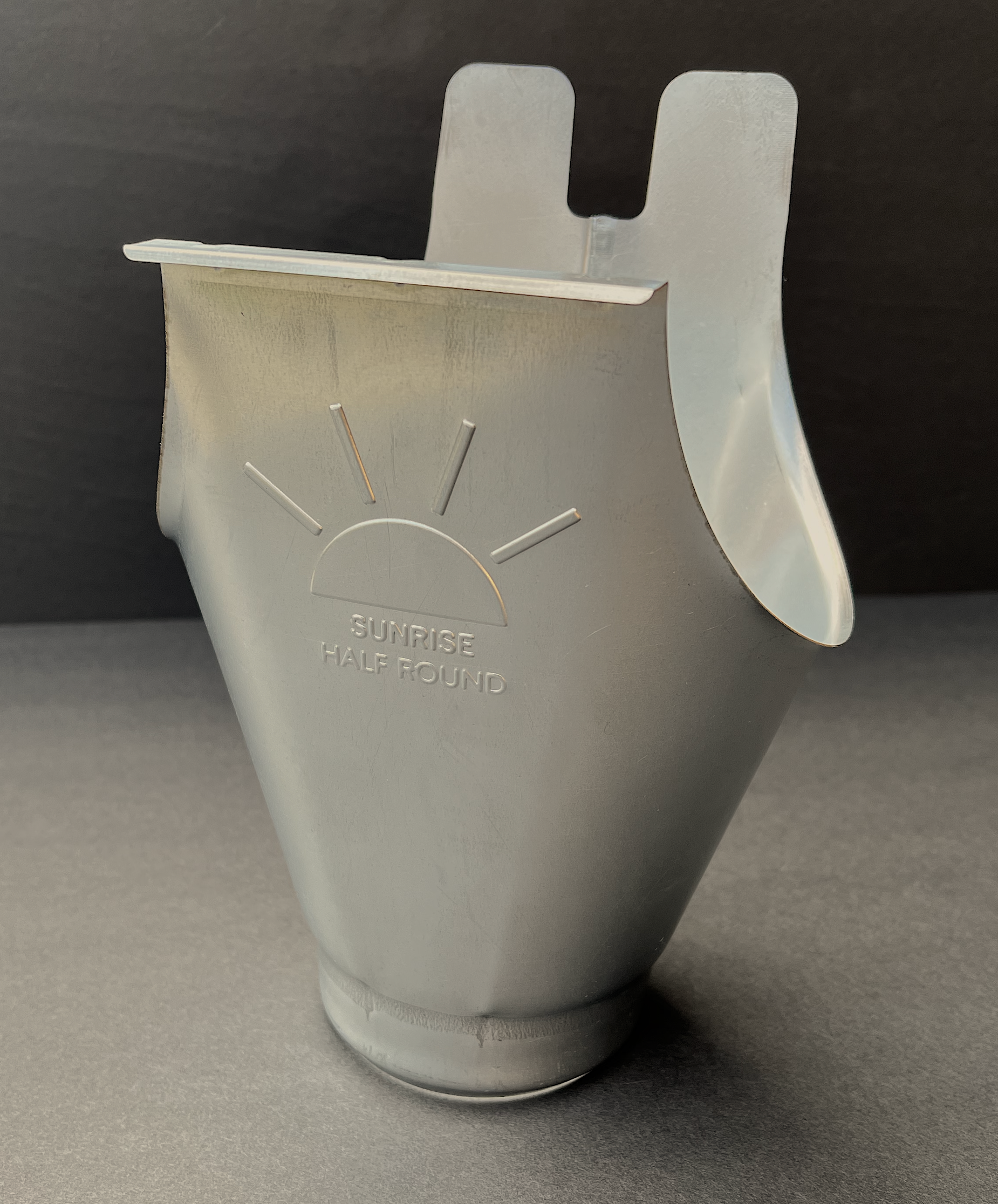 Sunrise Downspout Outlet | 6"--4" Galvanized Steel Downspout Outlet